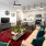 well lit living room with large windows